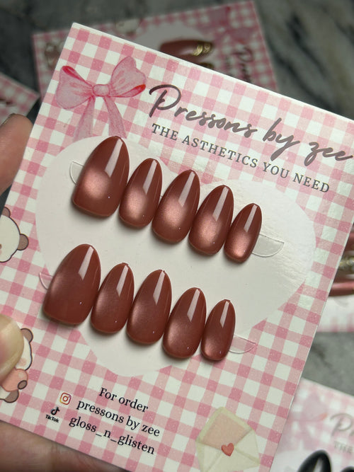 Toasted hazelnut cateye pressons